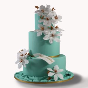 Tiffany Colour Cake With White Colours flowers.