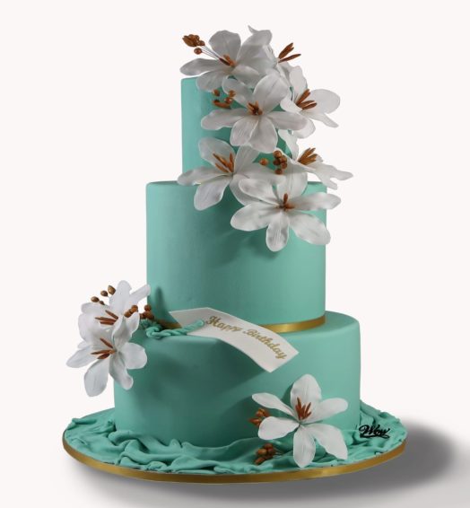 Tiffany Colour Cake With White Colours flowers.